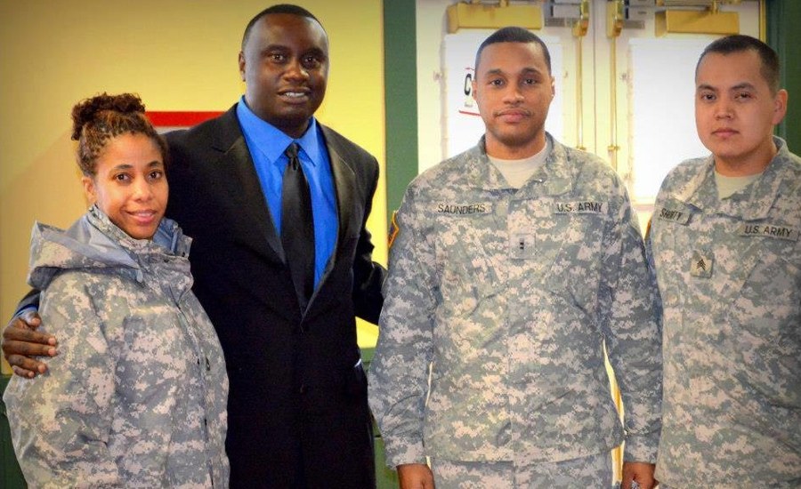 Dr. Davies Chirwa with U.S. Army service members