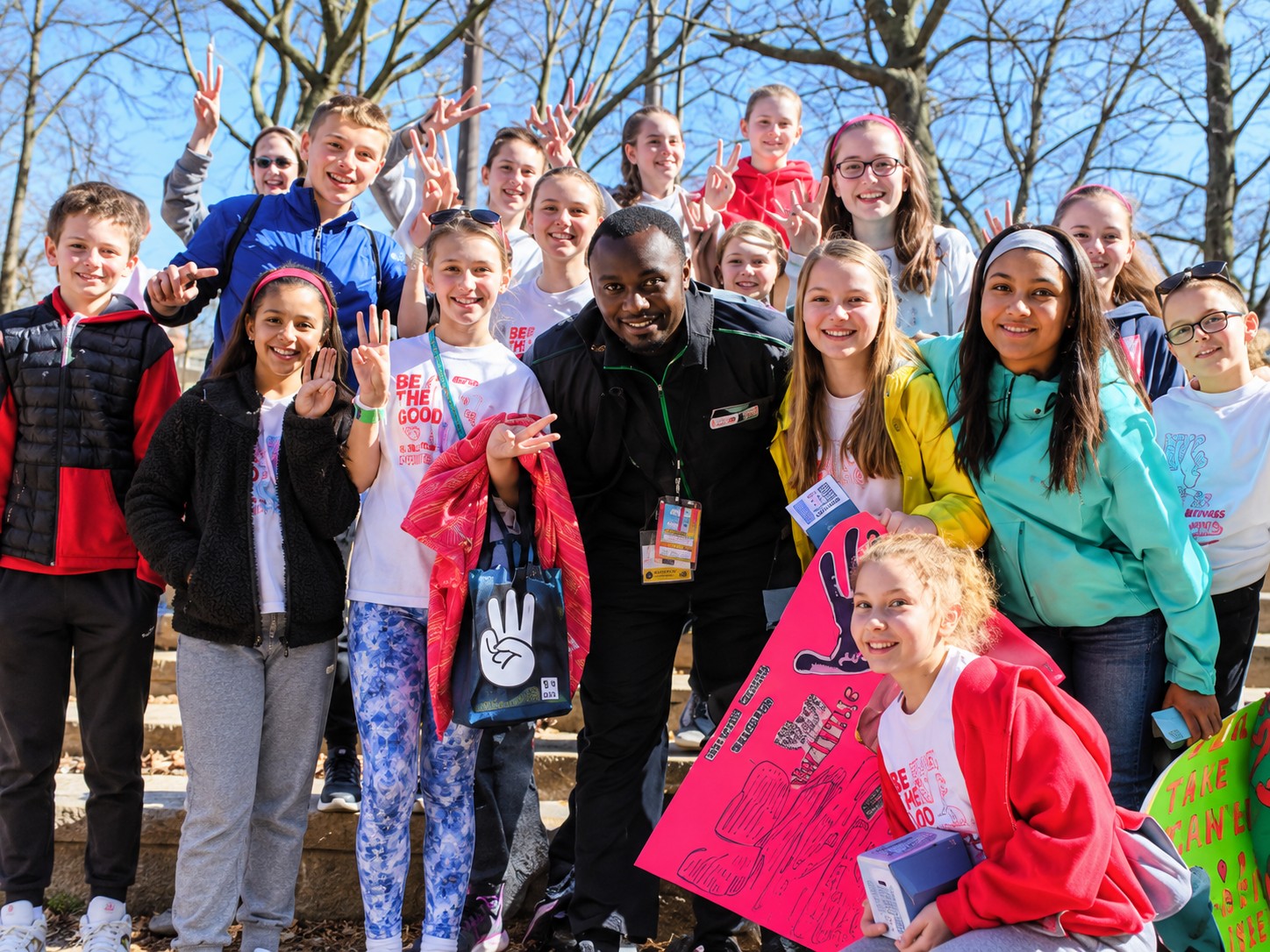 Dr. Davies Chirwa with students at a WE Day youth event